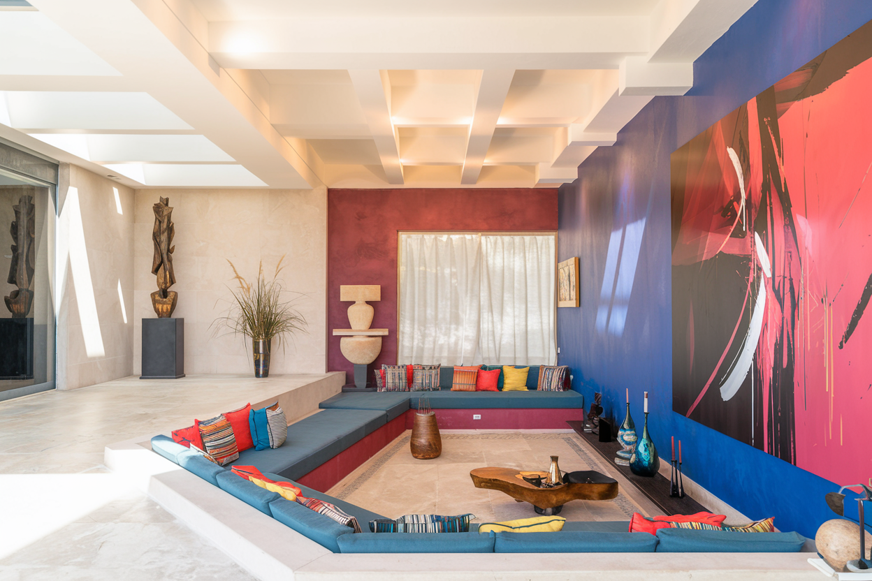 modern conversation pit with art on the wall